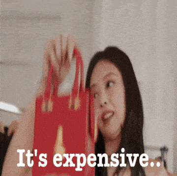 a woman holding a red bag with the words " it 's expensive " below her