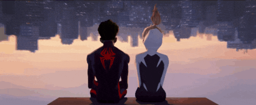 a man and a woman are sitting on a ledge looking at the city skyline
