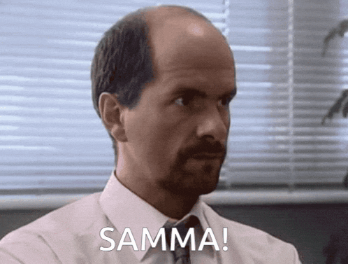 a man in a white shirt and tie says samma