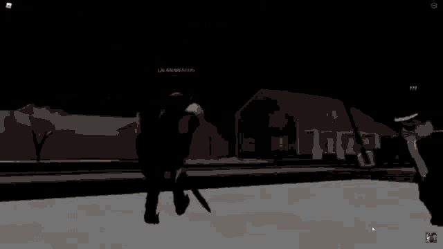 a blurred image of a person in a dark room