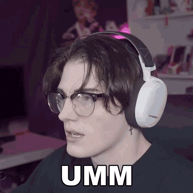 a man wearing glasses and headphones has the word umm above his head