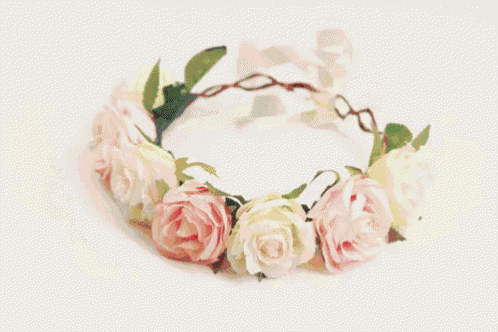 a flower crown with purple flowers and brown branches on a white background