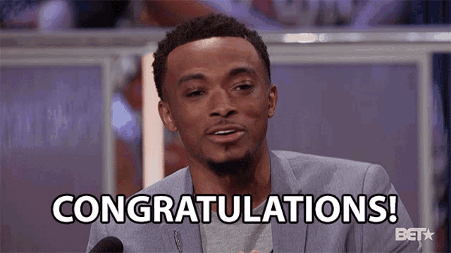 a man in a suit says congratulations on a bet show