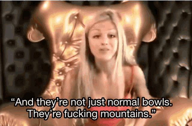 a woman sits in a chair with the words " and they 're not just normal bowls they 're fucking mountains