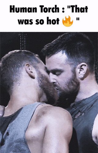 a picture of two men kissing with the caption " human torch "