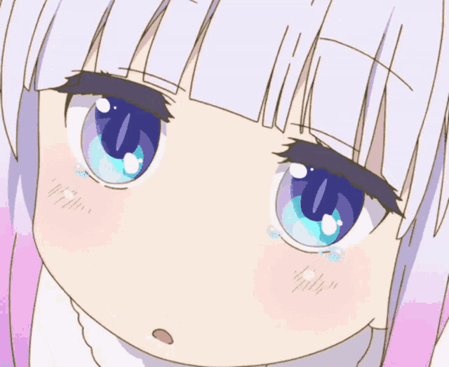 a close up of a girl 's eyes with the word i am on her cheek