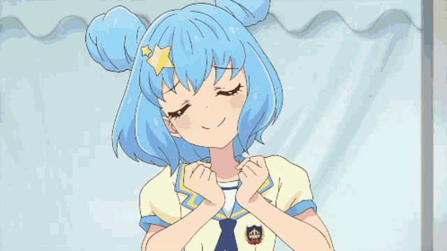 a girl with blue hair and a star on her head is smiling