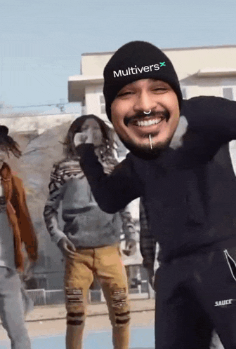 a man wearing a hat that says multivers x