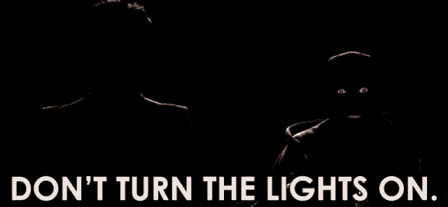 a poster that says " do n't turn the lights on " on it