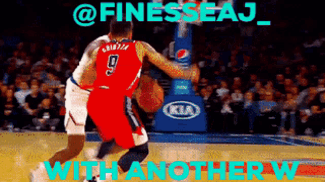 a basketball player with the number 9 on his jersey is dribbling the ball
