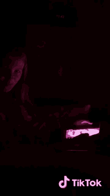a close up of a person 's face with a tiktok watermark