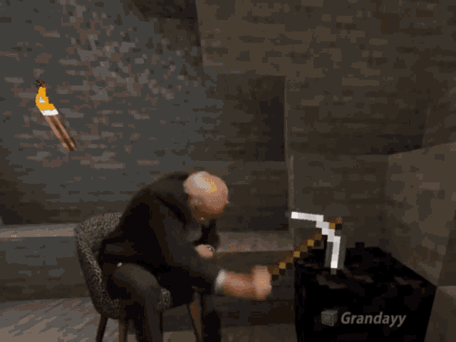 a man in a chair is playing a video game called granday