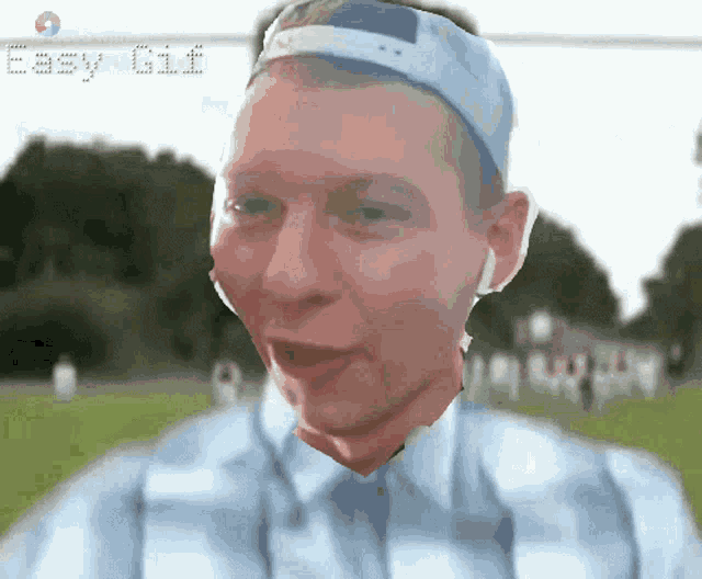 a gif of a man wearing a hat and earbuds