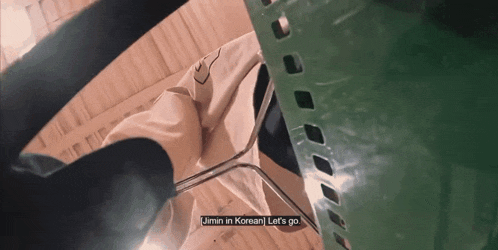 jimin in korean let 's go is written on a green screen