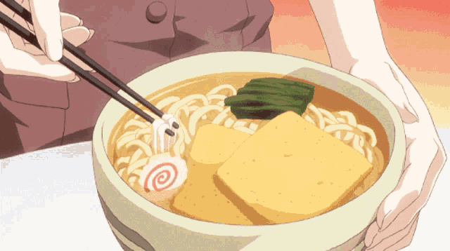 a person is eating noodles with chopsticks and a swirl on the noodles
