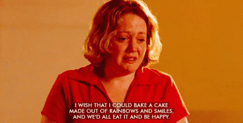 a woman in a red shirt is crying and saying i wish that i could bake a cake made out of rainbows