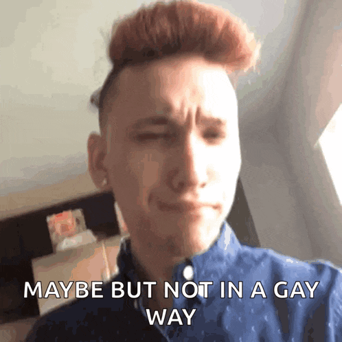 a man with red hair is making a sad face with the words maybe but not in a gay way below him