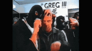 a group of masked men standing in front of a sign that says greg