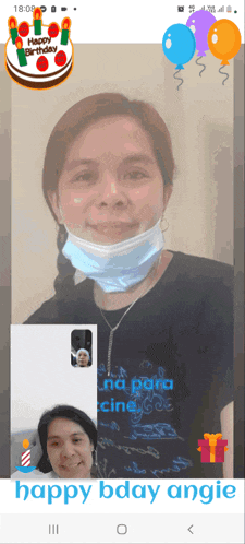 a woman wearing a face mask is on a video call with a birthday cake and balloons behind her
