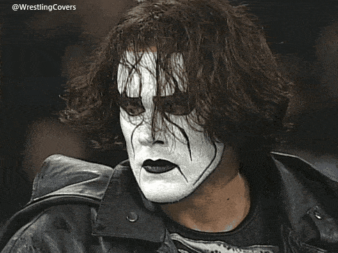 a close up of a wrestler 's face with the hashtag wrestlingcovers