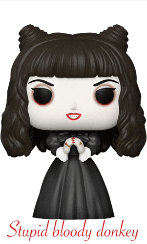 a funko pop of a woman in a black dress