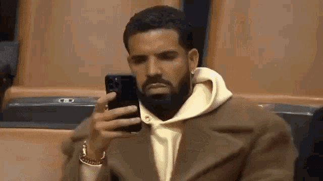 Drake Phone Drake Mad Looking At Phone GIF - Drake Phone Drake Mad Looking At Phone Drake Looking At Phone GIFs