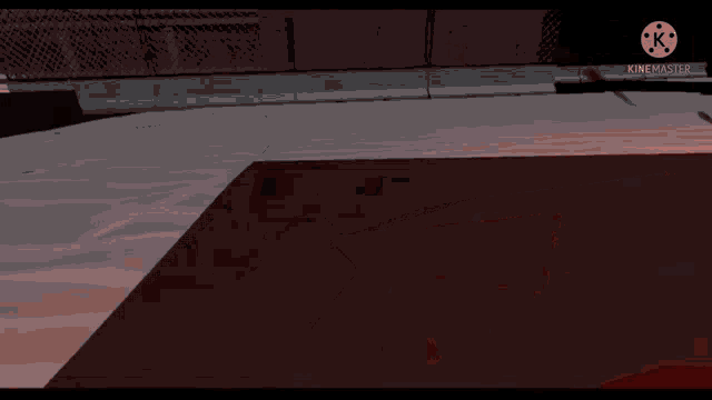 a video game character is holding a knife in a dark room