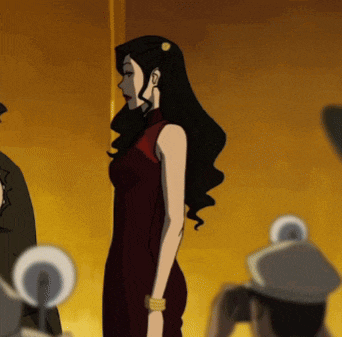 a woman in a red dress stands in front of a group of men