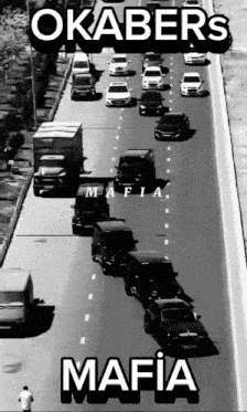 a black and white photo of cars driving down a highway with the words mafia on the bottom