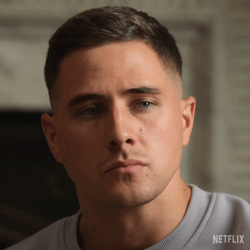 a close up of a man 's face with the netflix logo visible