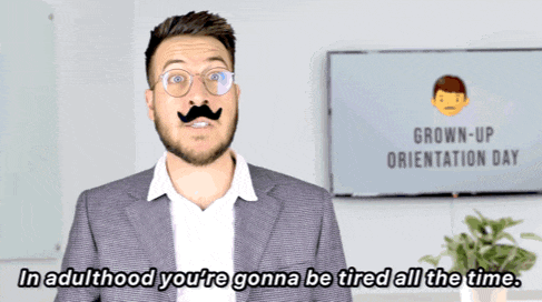 a man wearing glasses and a fake mustache says in adulthood you 're gonna be tired all the time