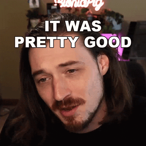 a man with long hair and a beard has the words it was pretty good above him