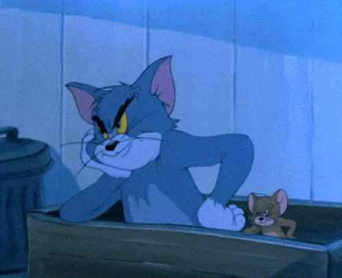 a cartoon of tom and jerry are sitting in a trash can