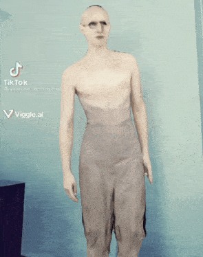 a man without a shirt is on a tik tok