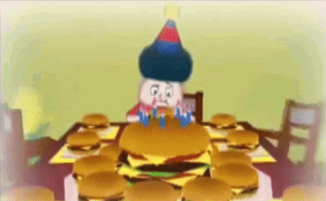a cartoon character wearing a party hat is eating a hamburger .