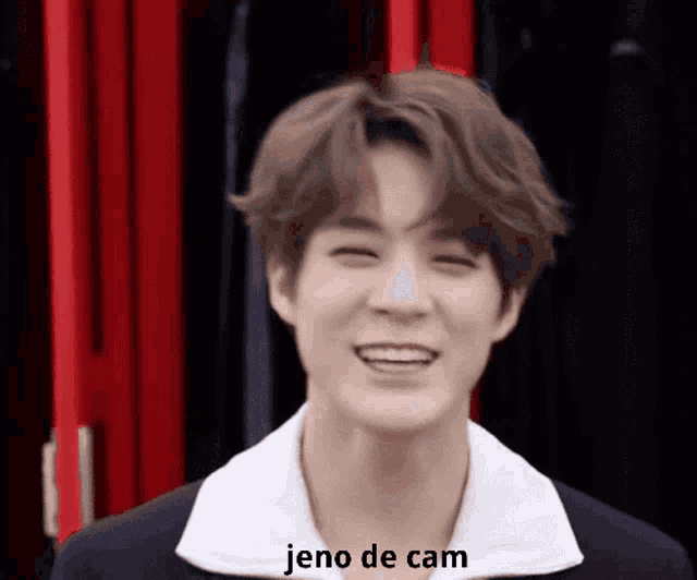 a close up of a man 's face with the words jeno de cam written below him