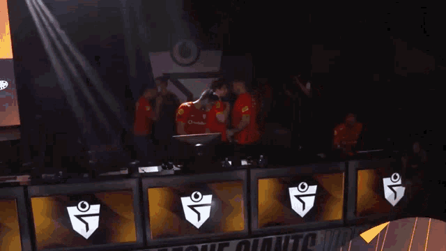 a group of people wearing red shirts with the letters atv on the front