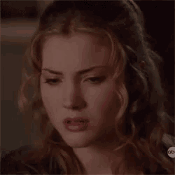 a close up of a woman 's face with abc written on the bottom right