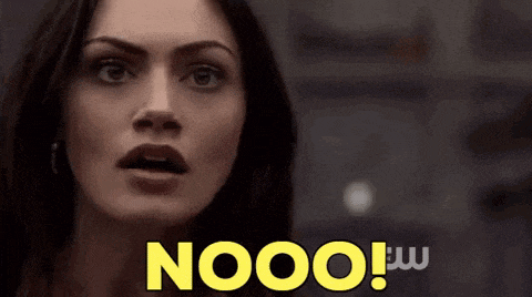 a close up of a woman 's face with the word nooo in yellow