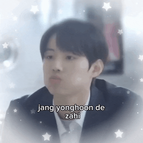 a young man in a suit and tie is surrounded by stars and the words jang yonghoon de sahi