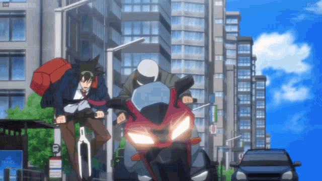 a man riding a motorcycle next to a man on a bike