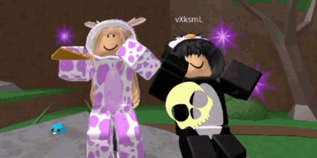 a girl in a cow costume is standing next to a boy in a panda outfit