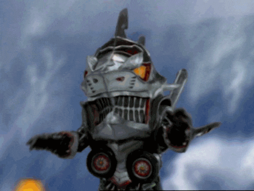 a robot with a shark 's head and wheels on its feet