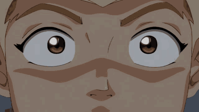 a close up of a cartoon character 's eyes with a surprised look on his face