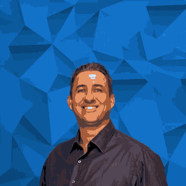 a man smiles in front of a blue background with the word abilio on it