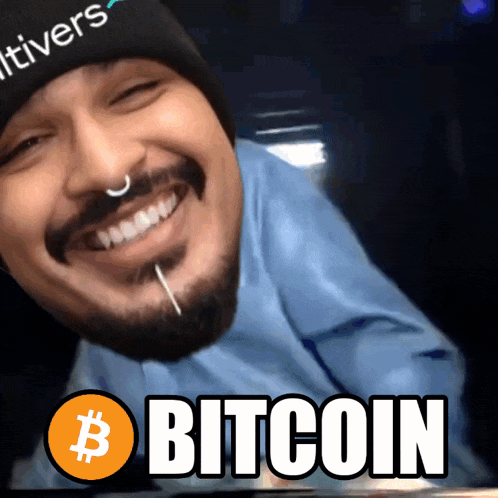 a man with a beard wearing a hat that says itivers