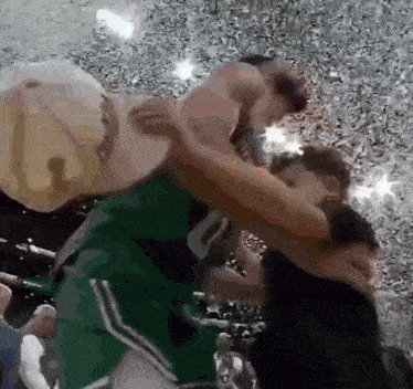 a basketball player wearing a green jersey with the number 20 on it