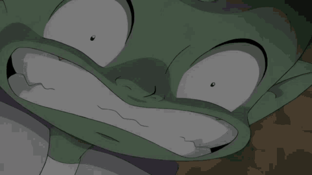 a close up of a cartoon character 's face making a funny face