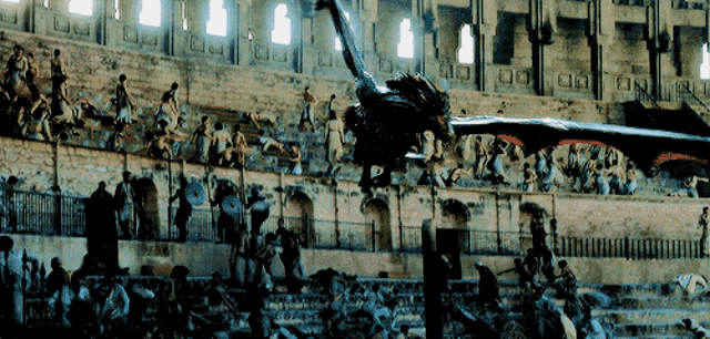 a dragon flies over a crowd of people in an arena