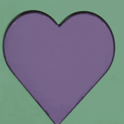 a heart with a green border is surrounded by balloons